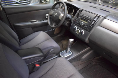 Nissan Tiida 1.6 AT (110 л. с.)