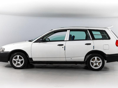 Mazda Familia 1.5 AT (110 л.с.)