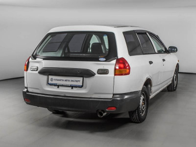 Nissan AD 1.3 AT (87 л.с.)