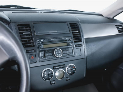 Nissan Tiida 1.6 AT (110 л. с.)