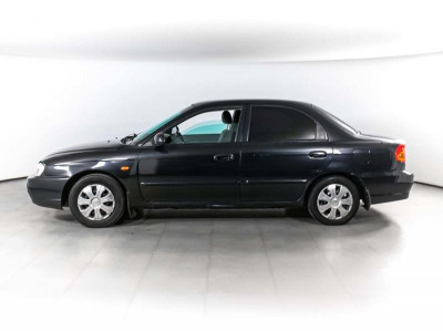Kia Spectra 1.6 MT (101 л. с.)